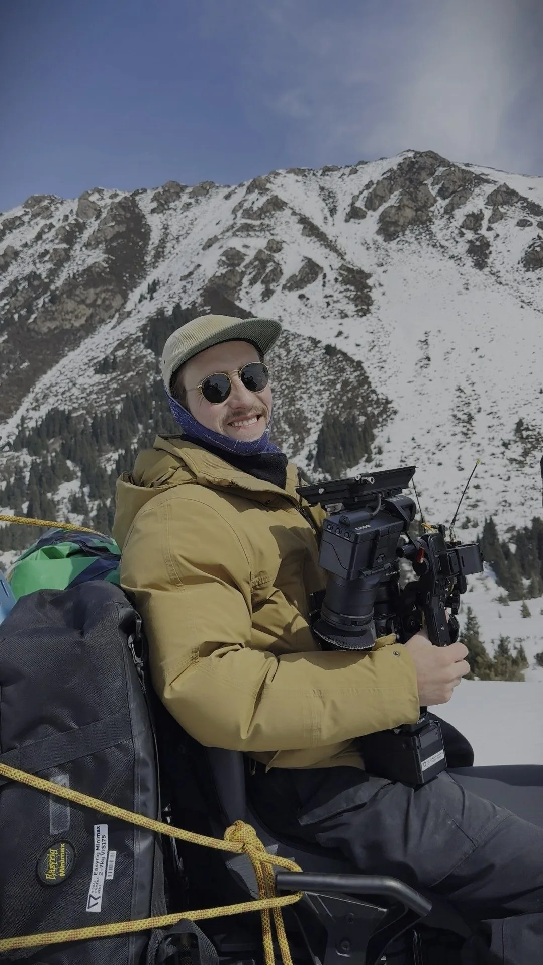 Frederic T. Kuntz on location in the mountains of Kyrgyzstan, holding a camera rig